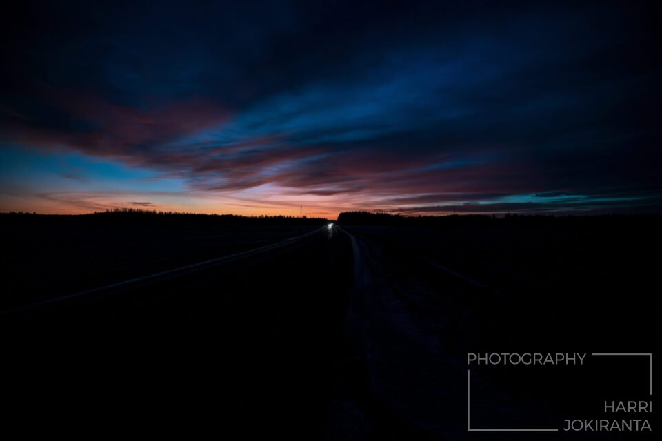 Sunset at the end of dark road …